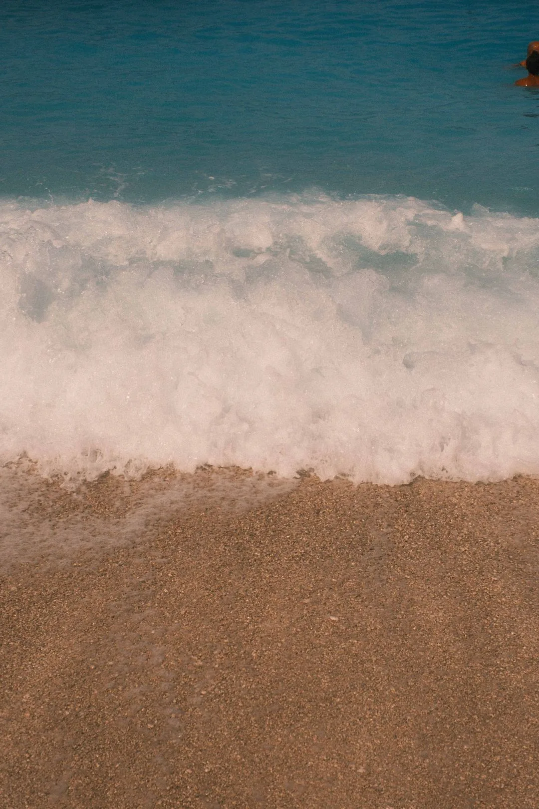 wave on pebbled beach phone wallpaper aesthetic