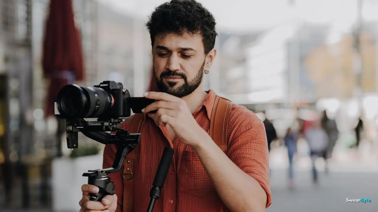 Content creator filming video with a camera stabilizer
